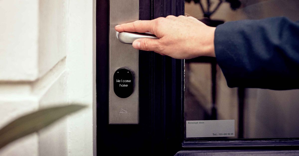 locksmith unlocking front door — Stone Mountain Locksmith Pros